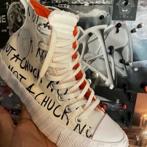 Converse Chuck 70 White Hi Sneakers with Black Text